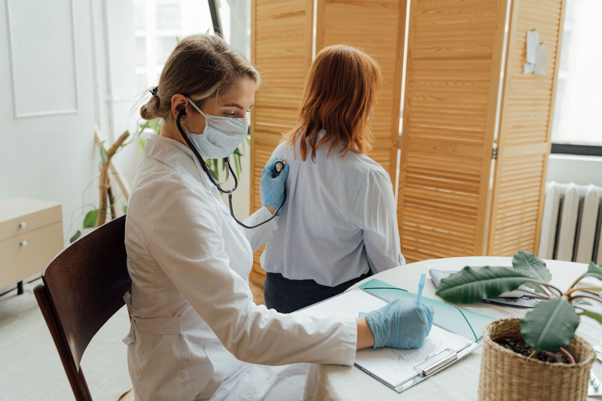 Doctor examining a patient during a routine medical checkup